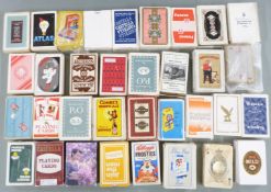 Approximately 35 single packs of advertising playing cards, shipping etc