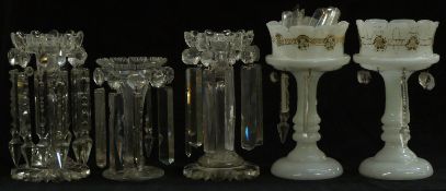Two pairs of Victorian glass lustre vases, one pair opaline the other clear, together with another