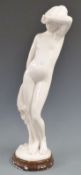 A glazed figurine of a nude maiden, H 66cm