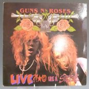 Guns N' Roses - Live Like A Suicide (USR-001) record appears Ex with slight wear to cover