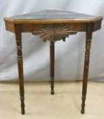 Three-legged corner table with carved floral design, W 76 x H 90cm