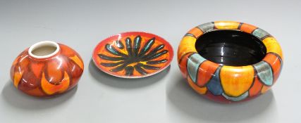 Poole pottery jardiniere, pedestal vase and a Delphis dish, tallest 12, diameter 24cm
