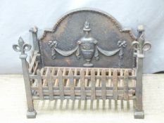 A fire grate with integral fire back, W57 D26