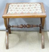 Ornate stool with embroidery seat raised on cross stretchers together with cross stitch embroidery