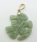 A 14k gold and jadeite pendant, 3cm