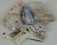 A large quantity of Australia and dependencies loose stamps and seven annual Australian stamp