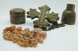 Two Islamic metal pots and a white metal cross pendant