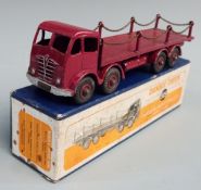Dinky Toys diecast model Foden Flat Truck with Chains and maroon cab, chassis, bed and hubs, 505, in