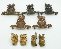 Nine British Army The Queen's Own Royal West Kent Regiment metal collar badges in four pairs plus