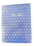 An album containing approximately seventy five cloth shoulder titles mainly for the Australian