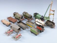Fifteen Hornby 0 gauge locomotives, rolling stock and accessories including three clockwork 0-4-0