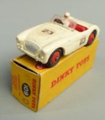 Dinky Toys diecast model Austin-Healey '100' Sports with cream body, red interior and hubs, white