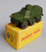 Dinky Toys diecast model Amoured Personnel Carrier with green body and hubs, 676, in original box.