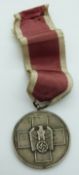 Nazi German social welfare medal with Swastika and eagle to front