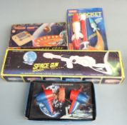 Four space related toys comprising Japanese Space Station Morse Code Signalling Set, Space Gun