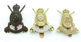 Three British Army Hampshire Carabiniers metal cap badges including an officer's service dress