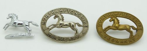 Three British Army Northamptonshire Yeomanry metal badges including an all brass example and one