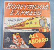 Louis Marx & Co The Honeymoon Express clockwork tinplate train, in original box.