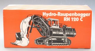 Conrad Models 1:50 scale diecast model Hydro-Raupenbagger RH 120 C excavator with red body, white