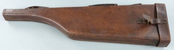 A vintage leather 'leg of mutton' gun case with shoulder strap, 80x22x7cm.