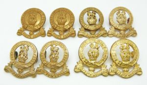 Eight British Army metal collar badges, two pairs for the 14th Hussars and two for the 14th/20th