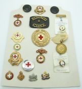 A carded collection eighteen of Red Cross badges including County of Cork, Nigerian and South