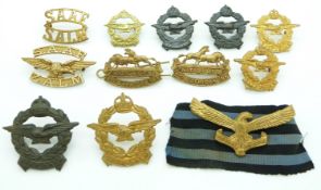 Ten South Africa Air Force metal badges together with two South Africa Army badges, one by G and S