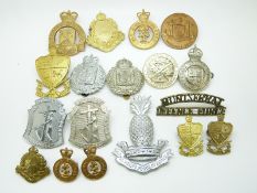 Eighteen British Commonwealth military badges including examples for Honduras, Belize, Montserrat