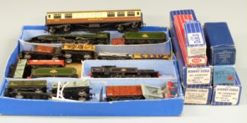 Twenty-six Hornby Dublo 00 gauge locomotives, wagons, coaches and accessories including BR 4-6-2