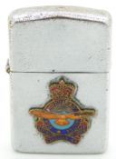 Canadian Air Force interest Penguin lighter with Royal Canadian Air Force badge to one side and