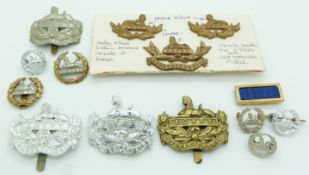 Fourteen British Army Gloucestershire Regiment badges including c1901 set of cap and collar badges