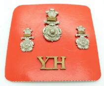 British Army Yorkshire Yeomanry Hussars badge set comprising cap badge, collar badge and shoulder