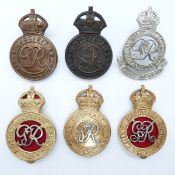 Six British Army Royal Military College officer cadet's George VI cap badges