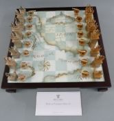 Royal Mint Battle of Trafalgar chess set with glass-topped brass chessboard with storage drawers and