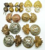 Twelve British Army Royal Northumberland Fusiliers metal collar badges etc
