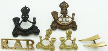 Six King's African Rifles metal badges including Depot/Training Company examples