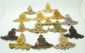 Fifteen British Army Royal Artillery metal cap and other badges with various fixings, four by J.R