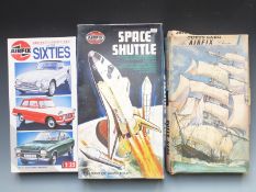 Three Airfix plastic model kits comprising Series 9 Cutty Sark, 1:144 scale Space Shuttle and 1:32