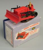 Dinky Supertoys diecast model Blaw Knox Bulldozer with red body and blade and green rubber tracks,