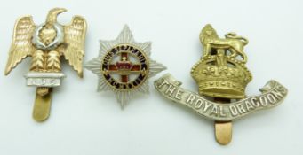 Three British Army Dragoons metal badges including a white metal and enamel example, one by Gaunt