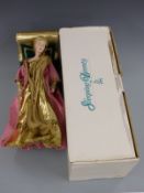 Three Danbury Mint dolls Sleeping Beauty, The Shirley Temple Stand Up And Cheer Doll and Mei Lan,