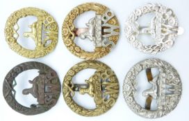 Six British Army South Wales Borderers metal cap badges
