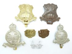 Seven Birmingham and Cambridge Universities Officer Training Corps metal badges