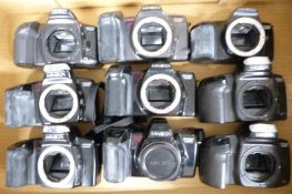 Nine Minolta Dynax SLR camera bodies comprising 300si, 3000i, 500si, 5000i, 7000i and 8000i