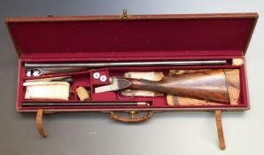 J & W Tolley 12 bore side by side ejector shotgun with named locks, engraved scenes of dogs and