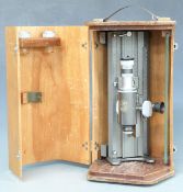C. Baker London travelling microscope with Chesterman vernier scale, overall length 32cm, in