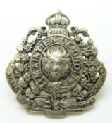 Canada North West Mounted Police white metal badge, Gaunt and Son London to reverse