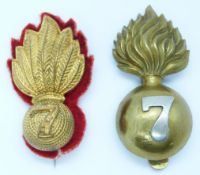 Two British Army 7th Battalion City of London Regiment cap badges, one an officer's gilt metal