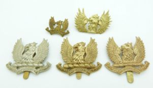 Five British Army Earl of Carrick's Own Ayrshire Yeomanry metal badges including a collar badge