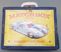 A collection of Matchbox 1-75 series diecast model vehicles in a Matchbox Series 41 carry case.